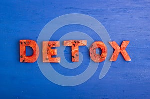 The detox word is made of slices of watermelon. The concept of diet, body cleansing, healthy eating