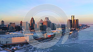 Detroit river with downtown aerial view winter at sunset