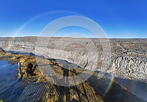 The Dettifoss canyon with rainbow circle in Iceland