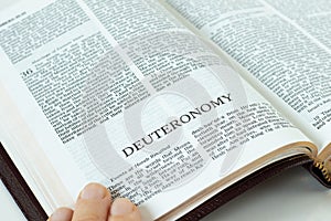 Deuteronomy Holy Bible Book. A close-up of open Old Testament Scripture