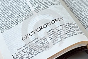 Deuteronomy open Holy Bible Book close-up