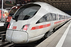 A Deutsche Bahn ICE Intercity bullet train waits at the Munich Main Railway Station (Munchen Hauptbahnhof)