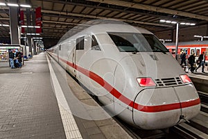 A Deutsche Bahn ICE Intercity bullet train waits at the Munich Main Railway Station Munchen Hauptbahnhof