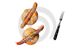 Deutsche Bockwurst sausage in a bun with French fries and curry sauce, currywurst. Isolated, white background.