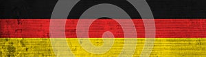 Deutsche Flagge - Rustikale Betonwand Textur, eingefÃÂ¤rbt in den Farben von der Flagge von Deutschland photo