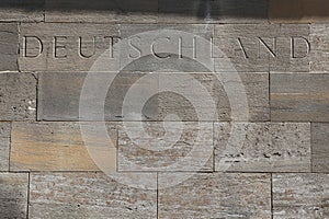 Deutschland (Germany). Word carved into stone blocks.