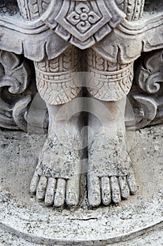 Deva carving statue ,The foot of graven image. photo