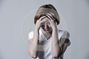 Devastated depressed woman crying sad feeling hurt suffering depression in sadness emotion