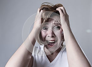 Devastated depressed woman crying sad feeling hurt suffering depression in sadness emotion photo