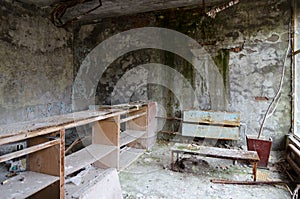 Devastation in hall of hospital, abandoned ghost town of Pripyat in Chernobyl NPP alienation zone, Ukraine