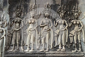 Devatas. One of many bas reliefs in Angkor Wat Temple. Siem Reap, Cambodia.