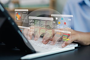 Developer coding data analysis dashboard on laptop with virtual interface, software engineer programming digital system