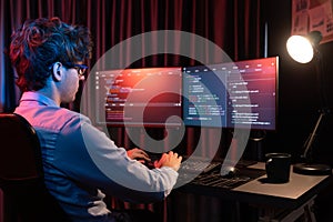 IT developer creating online software information coding on pc screen. Gusher.