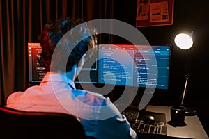 IT developer creating online software information coding on pc screen. Gusher.