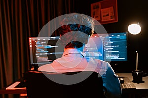 IT developer creating online software information coding on pc screen. Gusher.