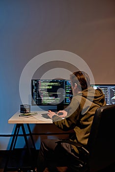 IT developer mining cryptocurrency on PC at home