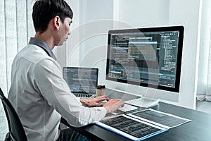 Developer programmer working on coding program software computer in office, Writing website and development database technology