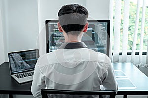 Developer programmer working on coding program software computer in office, Writing website and development database technology