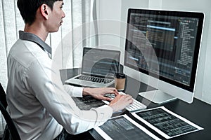 Developer programmer working on coding program software computer in office, Writing website and development database technology
