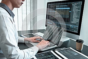 Developer programmer working on coding program software computer in office, Writing website and development database technology