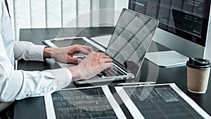 Developer programmer working on coding program software computer in office, Writing website and development database technology