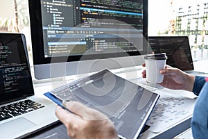 Developer programmer working on project in software development computer in IT company office, Writing codes and data code website