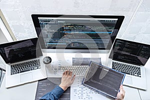 Developer programmer working on project in software development computer in IT company office, Writing codes and data code website