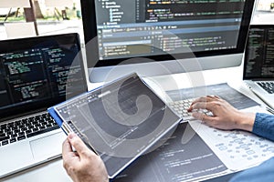 Developer programmer working on project in software development computer in IT company office, Writing codes and data code website