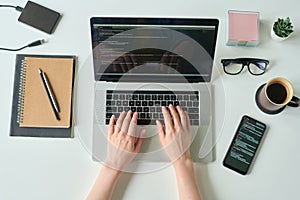 Developer programming language and program code on screen laptop