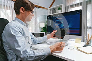 IT developer selecting by point on coding online software. Pecuniary.