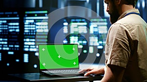 IT developer using mock up laptop