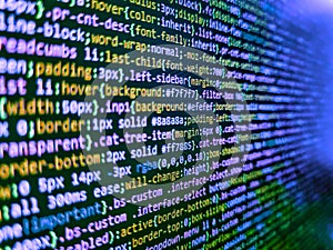 Developer working on program codes. Abstract computer script  code. HTML code on lcd screen. Abstract source code background. Web