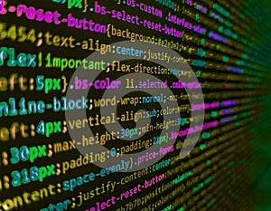 Developer working on software codes in office. Closeup of Web Code on Computer LED Screen. Screen of web developing javascript