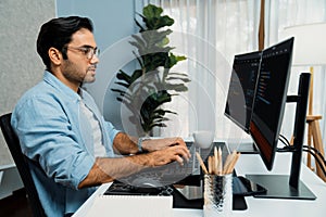 Developer working software development coding two computer code screen. Surmise.