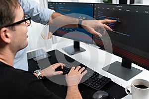 IT developers creating online software development information. Sellable.