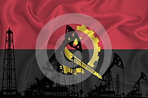 Developing Flag of Angola. Silhouette of drilling rigs and oil rigs on a flag background. Oil and gas industry. The concept of oil