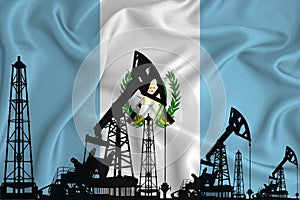 Developing Flag of Guatemala. Silhouette of drilling rigs and oil rigs on a flag background. Oil and gas industry. The concept of