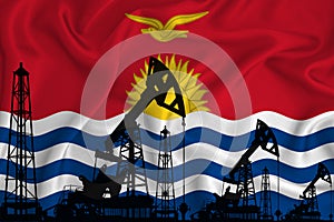 Developing Flag of Kiribati. Silhouette of drilling rigs and oil rigs on a flag background. Oil and gas industry. The concept of