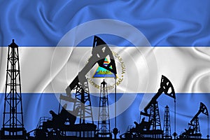 Developing Flag of Nicaragua. Silhouette of drilling rigs and oil rigs on a flag background. Oil and gas industry. The concept of