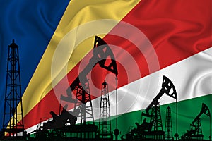 Developing Flag of Seychelles. Silhouette of drilling rigs and oil rigs on a flag background. Oil and gas industry. The concept of
