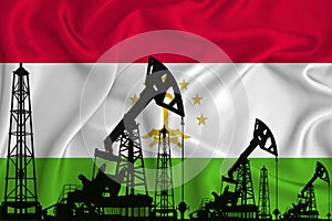 Developing Flag of Tajikistan. Silhouette of drilling rigs and oil rigs on a flag background. Oil and gas industry. The concept of