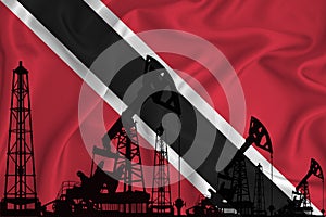 Developing Flag of Trinidad and Tobago. Silhouette of drilling rigs and oil rigs on a flag background. Oil and gas industry. The