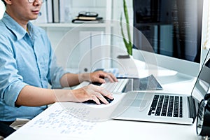 Developing programmer Development Website design and coding technologies working in software company office