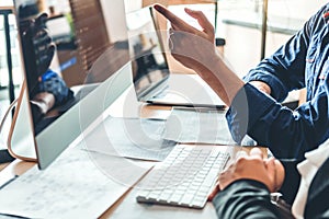 Developing programmer Team Development Website design and coding technologies working in software company office
