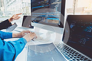 Developing programmer Team Development Website design and coding technologies working in software company office