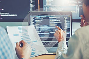 Developing programmer Team Development Website design and coding technologies working in software company office