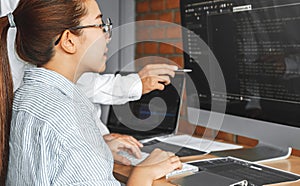 Developing programmer team reading computer codes Development Website design and coding technologies