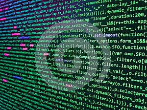 Developing programming binary code. Coding css on mornitor at the office - for background or montage product. Abstract program