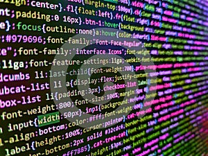 Developing programming binary code. Script on computer with source code. Web development code: CSS/SASS styles preprocessor script