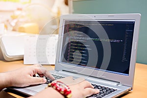Developing programming and coding technologies on desk, Website